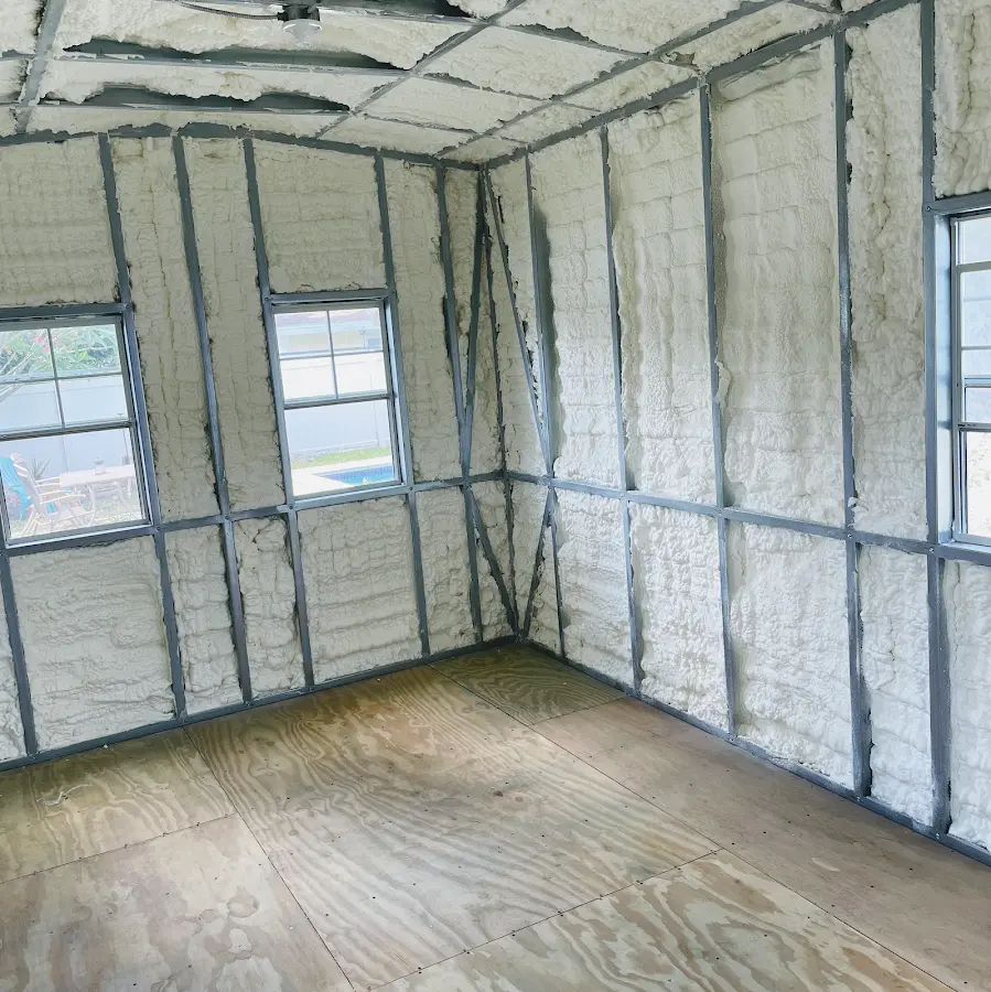 Closed-cell spray foam insulation applied to wall cavities in a residential project in Hobe Sound